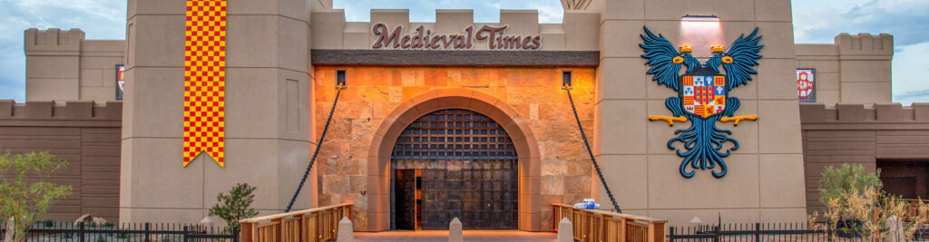 The entrance to a castle hosting the Medieval Times Dinner & Tournament in Arizona.