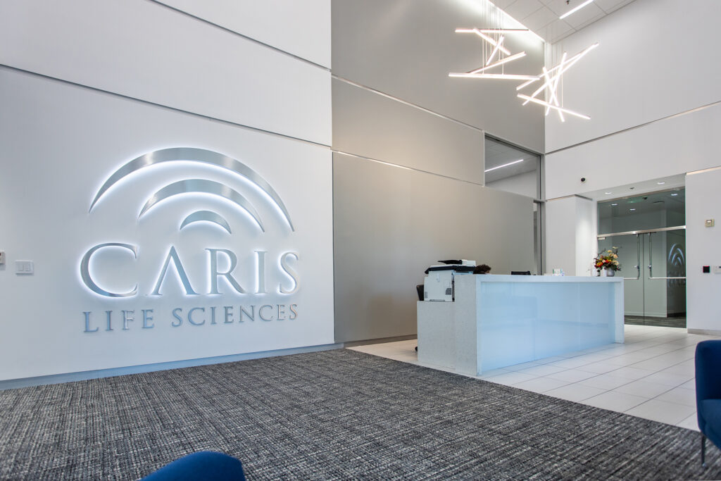 The lobby of caris life sciences showcases various projects.