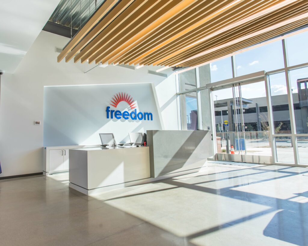 The lobby of Freedom Financial with the word "Rio" on it.