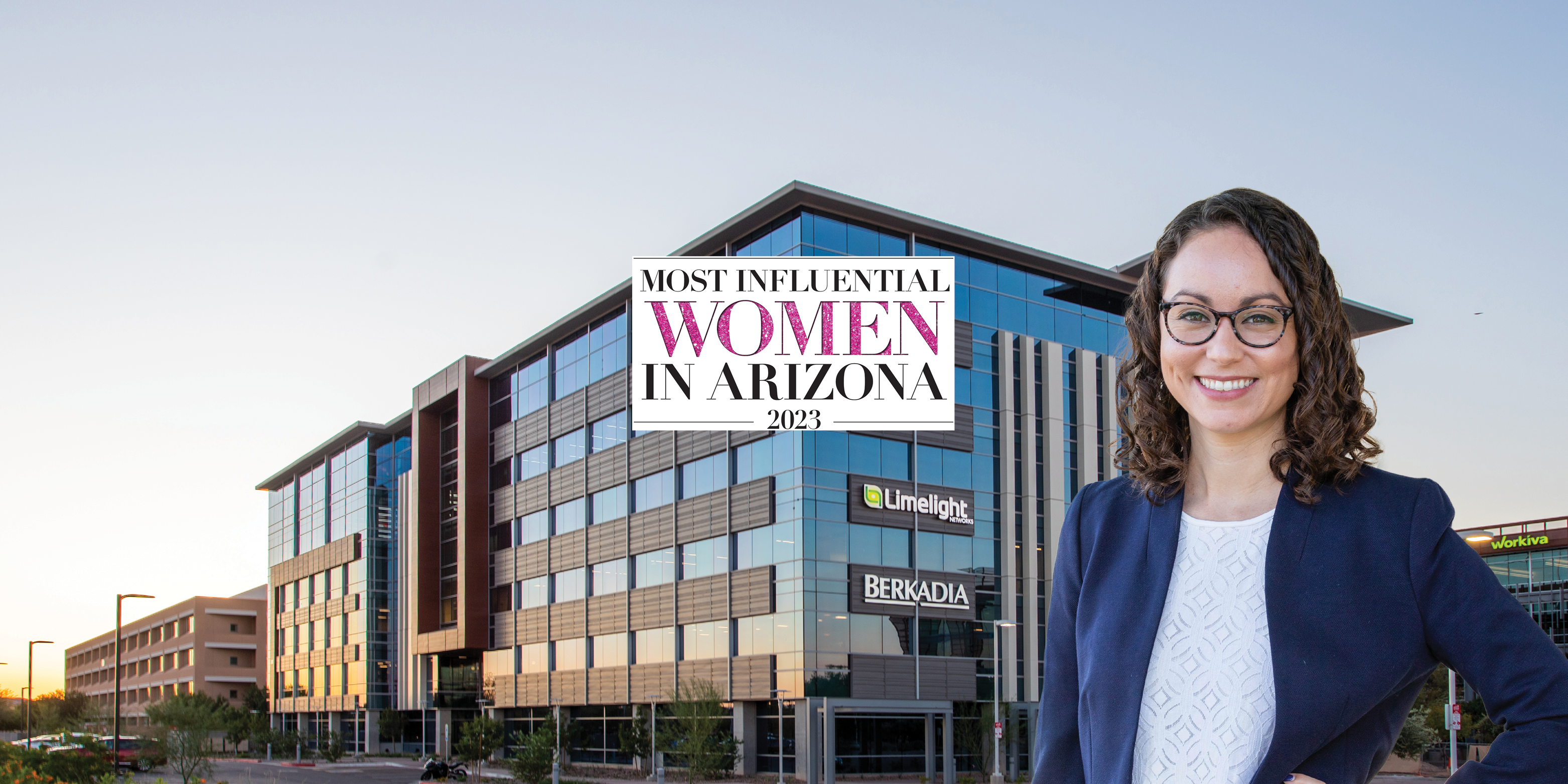 A woman standing in front of a building with the words most influential women in arizona.